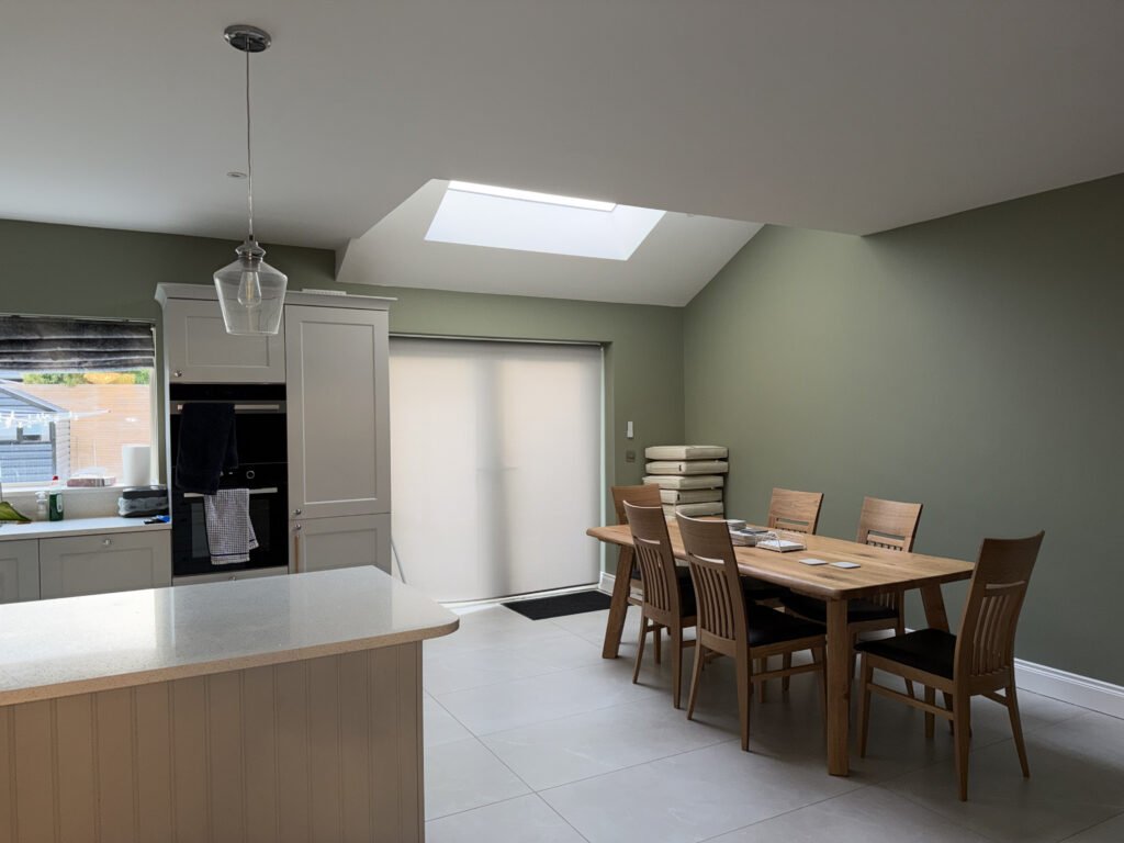 kitchen painting in greenish from colour trend. An extreme premium finish on walls and woodwork.